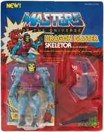 MASTERS OF THE UNIVERSE "DRAGON BLASTER SKELETOR" ON CARD.