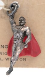 SUPERMAN STERLING SILVER CARDED DEL WESTON CHARM.