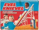 "EVEL KNIEVEL BATTERY POWERED TOOTHBRUSH" BOXED NOVELTY.