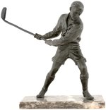FIELD HOCKEY OR SHINTY PLAYER CAST METAL STATUE.