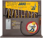 "SHAKY JAKE TESTER - TEST OF CHAMPIONS." COIN-OPERATED BAR MACHINE.
