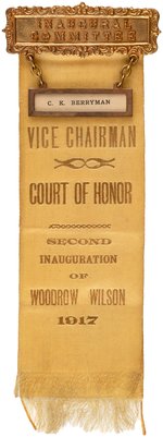 CARTOONIST CLIFFORD BERRYMAN'S 1917 WILSON "INAUGURAL COMMITTEE" RIBBON BADGE.