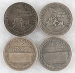 FOUR SILVER "U.S.TREASURY AWARD" MEDALS FOR PATRIOTIC SERVICE 1941-1958 WITH TWO INSCRIBED.