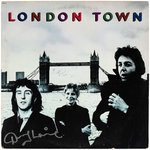 WINGS "LONDON TOWN" LP ALUM COVER SIGNED BY LINDA McCARTNEY & DENNY LAINE.