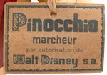 PINOCCHIO RARE FRENCH COMPOSITION WALKING DOLL WITH STRING TAG.