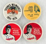 HANK AARON FOUR PICTURE BUTTONS INCLUDING TWO VARIETIES OF MAGNAVOX 715 CLUB.