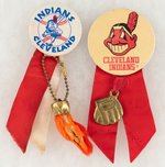 INDIANS LOGO BUTTON PAIR WITH SUSPENSIONS MUCHINSKY BOOK PHOTO EXAMPLES.