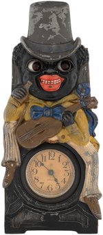 BLACK AMERICANA EARLY MOVING EYES CLOCK.