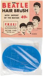 "AUTHENTIC BEATLE WIG" & "THE BEATLE HAIR BRUSH" BAGGED PAIR.