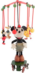 MICKEY MOUSE CELLULOID CAROUSEL WIND-UP TOY.