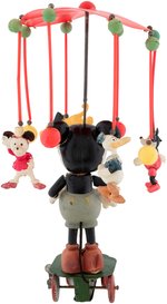 MICKEY MOUSE CELLULOID CAROUSEL WIND-UP TOY.