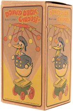 "DONALD DUCK CAROUSEL" BOXED CELLULOID WIND-UP TOY.