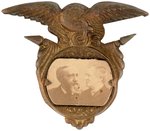 HARRISON/MORTON BRASS SHELL JUGATE BADGE.