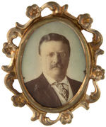 THEODORE ROOSEVELT 1904 FOUR SIMILARLY TINTED PINS, PENDANTS & STICKPIN.