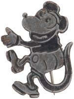 EARLY 1930s LIKELY GERMAN MADE FIRST SEEN EMBOSSED TIN STICKPIN DEPICTING MICKEY AS IF CLIMBING.