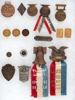 WWI LIBERTY LOAN 11 AWARDS AND SIX COMMITTEE MEMBER/OFFICER BADGES.