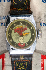 “TOM CORBETT SPACE CADET WRIST WATCH” ON ROCKET DISPLAY CARD.