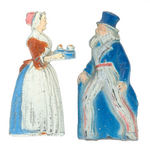 BAKER'S CHOCOLATE AND UNCLE SAM PAIR OF FIGURAL PENCIL SHARPENERS.