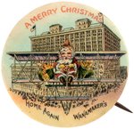 SANTA IN EARLY BI-PLANE BUTTON FROM WANAMAKERS SHOWING "STYLE B" BUILDING.