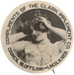 SEDUCTIVE YOUNG WOMAN REAL PHOTO LARGE BUTTON "COMPLIMENTS CLARK IMPLEMENT CO."