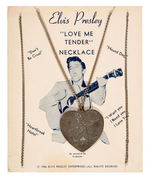 "ELVIS PRESLEY LOVE ME TENDER NECKLACE" ON DISPLAY CARD.