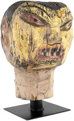 WORLD WAR II ANTI-JAPANESE CARVED WOODEN CARNIVAL HEAD.