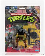 "TEENAGE MUTANT NINJA TURTLES - ROCKSTEADY" SERIES 1 10 BACK AFA 80 NM (SOFT HEAD).