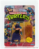 "TEENAGE MUTANT NINJA TURTLES - SHREDDER" SERIES 1 10 BACK AFA 85 NM+ (POP-UP DISPLAY).