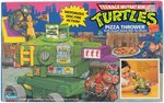 TEENAGE MUTANT NINJA TURTLES PIZZA THROWER FACTORY SEALED.