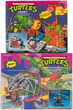 "TEENAGE MUTANT NINJA TURTLES" BOXED ACCESSORY LOT OF FOUR.