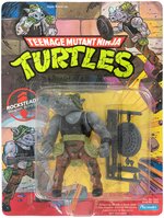 "TEENAGE MUTANT NINJA TURTLES" CARDED ACTION FIGURE LOT OF NINE.