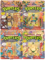 "TEENAGE MUTANT NINJA TURTLES" CARDED ACTION FIGURE LOT OF NINE.