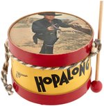 "HOPALONG CASSIDY" SMALL TOY DRUM WITH PRINTED RUBBER HEADS & DRUMSTICK.