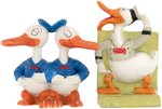 LONG-BILLED DONALD DUCK BISQUE TOOTHBRUSH HOLDER PAIR.