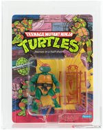 "TEENAGE MUTANT NINJA TURTLES - MICHAELANGELO" SERIES 1 10 BACK AFA 85 NM+.