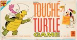 "TOUCHÉ TURTLE GAME."