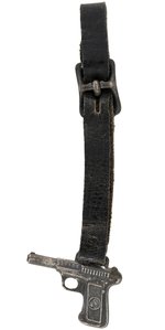 FIGURAL WATCH FOB PROMOTING THE FAMOUS "SAVAGE" MODEL 1907 PISTOL.