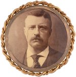 ROOSEVELT LARGE SEPIA TONED PORTRAIT BUTTON IN ORNATE BRASS RIM.