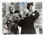 CHRISTOPHER LEE & PETER CUSHING DOUBLE-SIGNED PHOTO.