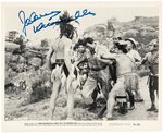 JOHNNY WEISSMULLER "JUNGLE JIM IN THE FORBIDDEN LAND" SIGNED MOVIE STILL.