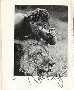 "TARZAN OF THE MOVIES" MULTI-SIGNED BOOK.