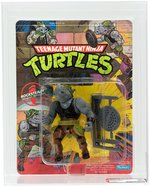 "TEENAGE MUTANT NINJA TURTLES - ROCKSTEADY" SERIES 1 10 BACK AFA 80+ NM.