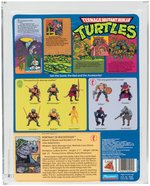 "TEENAGE MUTANT NINJA TURTLES - ROCKSTEADY" SERIES 1 10 BACK AFA 80+ NM.