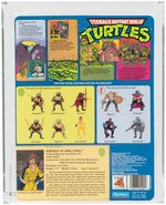 "TEENAGE MUTANT NINJA TURTLES - APRIL O'NEIL" SERIES 1 10 BACK AFA 85 NM+ (BLUE STRIPES).