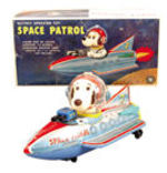 "BATTERY OPERATED SPACE PATROL TOY" WITH SNOOPY-LIKE ASTRONAUT.