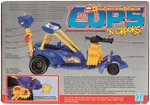 C.O.P.S. 'N CROOKS LOT OF EIGHT CARDED ACTION FIGURES AND BOXED DRAGSTER VEHICLE.