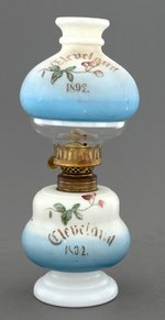 "CLEVELAND 1892" HAND PAINTED MILK GLASS LAMP.