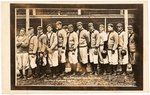 C. 1909 WAUSAU WISCONSIN LUMBERJACKS BASEBALL TEAM REAL PHOTO POSTCARD.