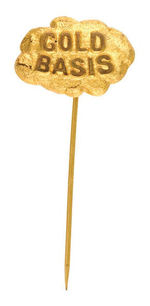 SIMULATED NUGGET 1896 "GOLD BASIS" BRASS SHELL STICKPIN.