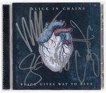 ALICE IN CHAINS BAND-SIGNED "BLACK GIVES WAY TO BLUE" CD & DRUMHEAD.